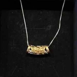 Sterling silver necklace. Unique tube floral pendant.